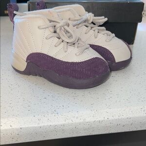 Air Jordan 12 size 6c toddler shoes in Cream and Purple